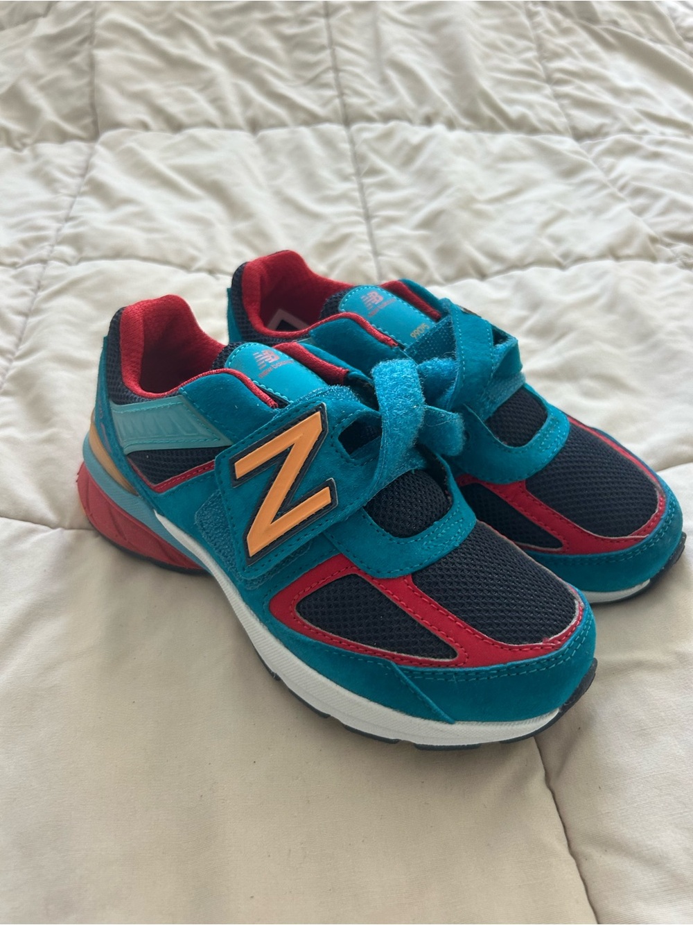 New Balance Kids Teal, Navy & Red Sneakers with Orange 'N'